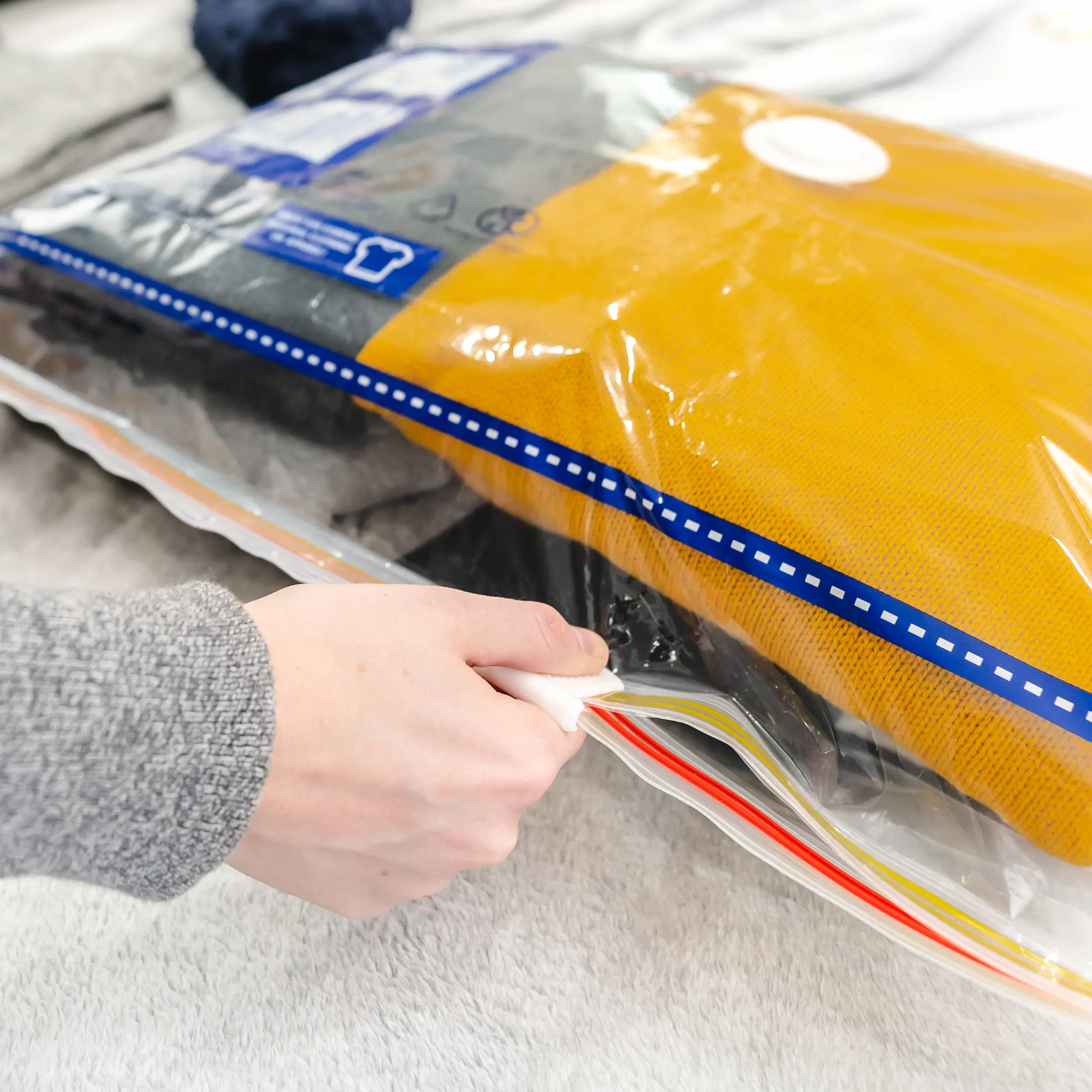 compression bag being zipped